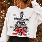 Vintage Christmas tree PNG with red bow star topper and ornaments - image 2