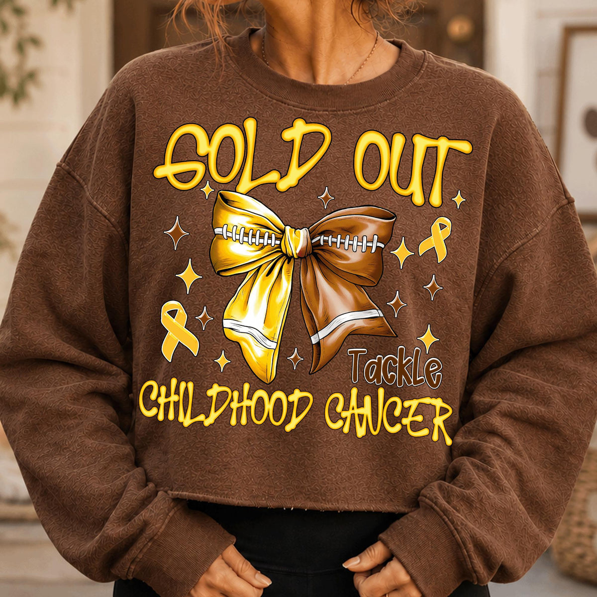 Gold Out childhood cancer awareness football bow PNG design for sublimation and DTF
