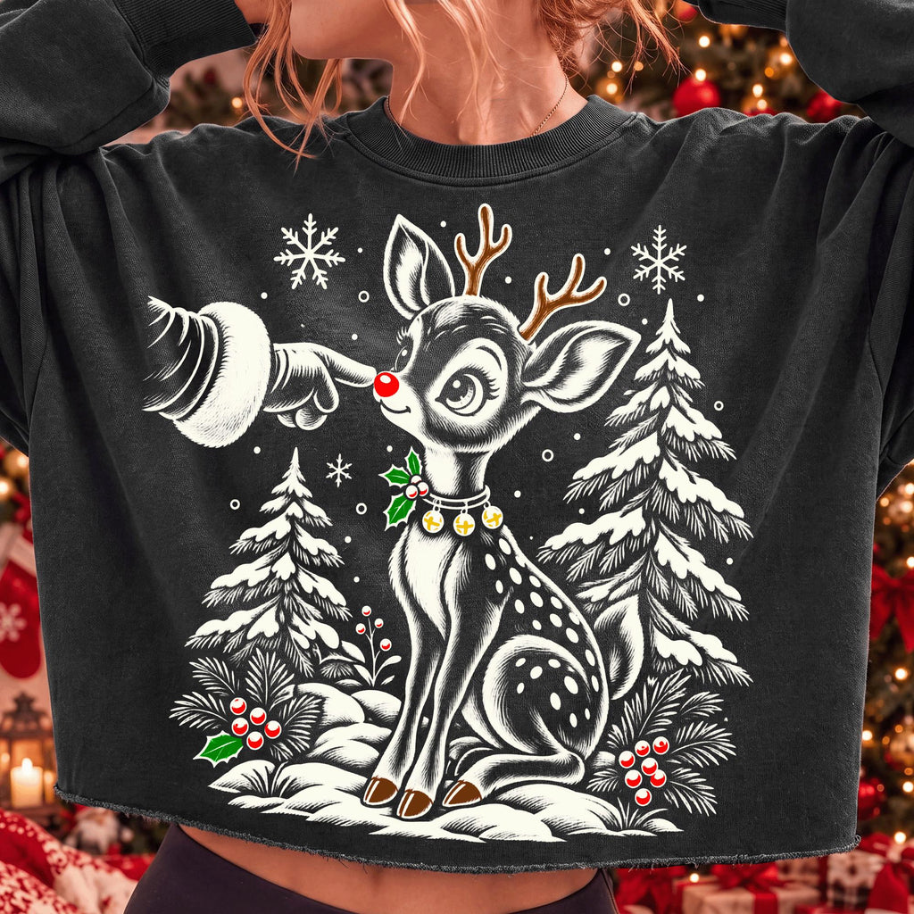 Vintage reindeer Christmas PNG with Santa hand booping a fawn nose