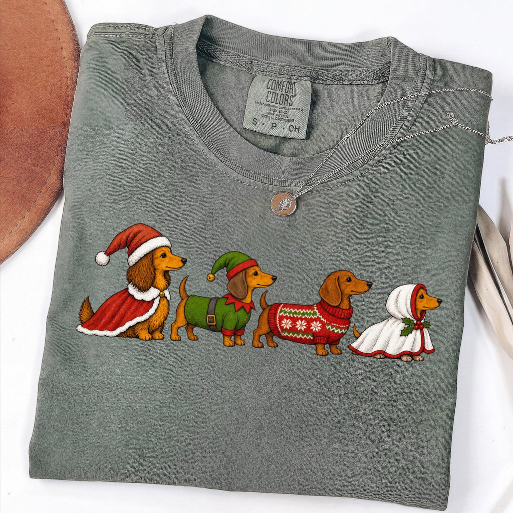 Christmas dachshund dogs in Santa and elf sweaters PNG design - image 3