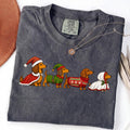 Christmas dachshund dogs in Santa and elf sweaters PNG design for sublimation and DTF