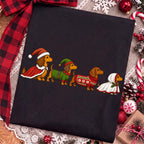 Christmas dachshund dogs in Santa and elf sweaters PNG design - image 9